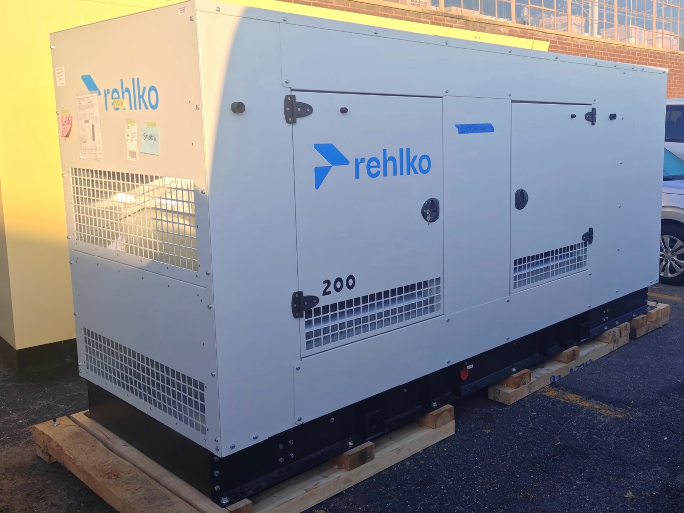 Rehlko 200 GMKG200-A generator on wooden pallets